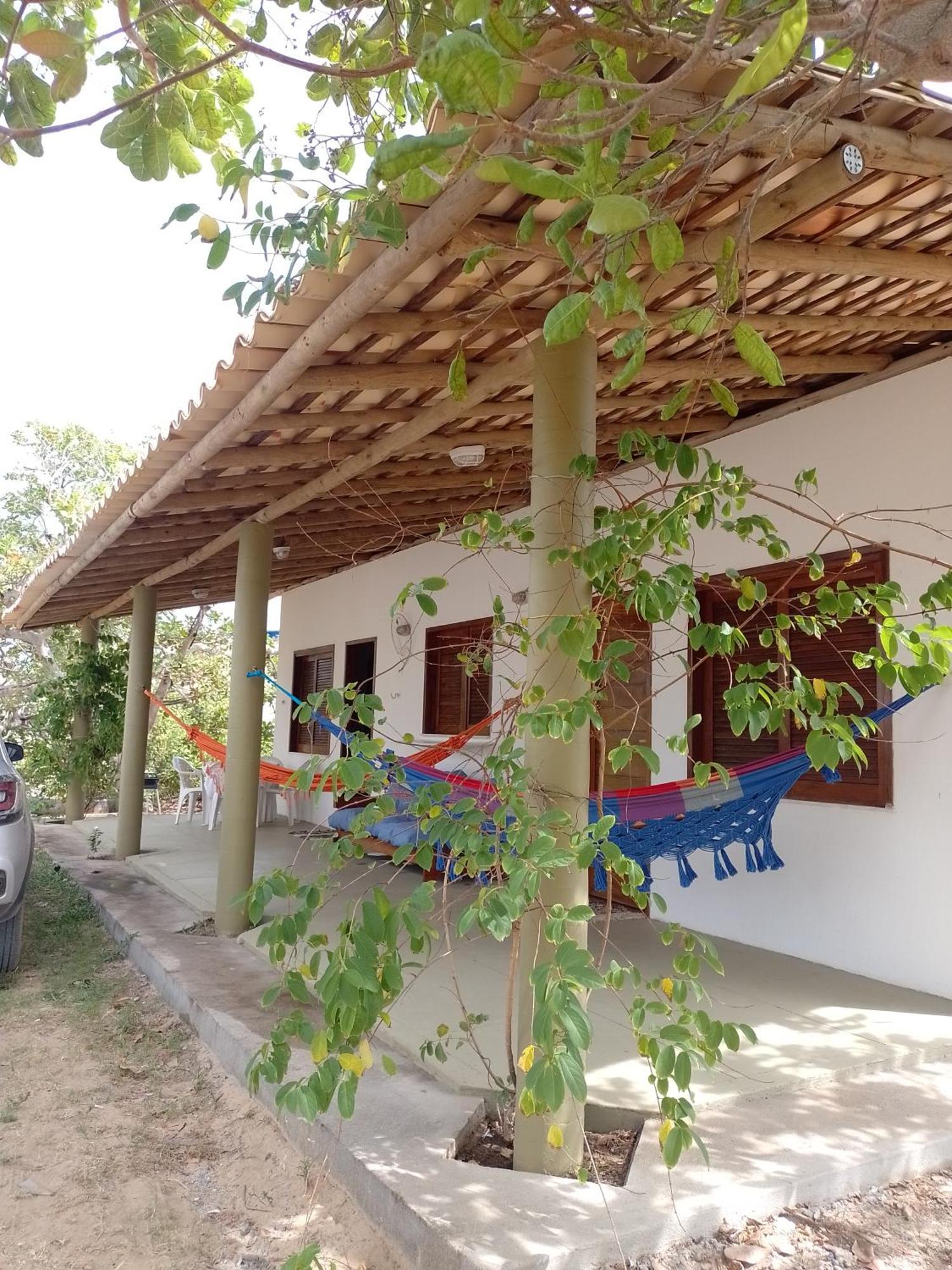 Chale Perto Da Com Duas E Varandao Holiday home *